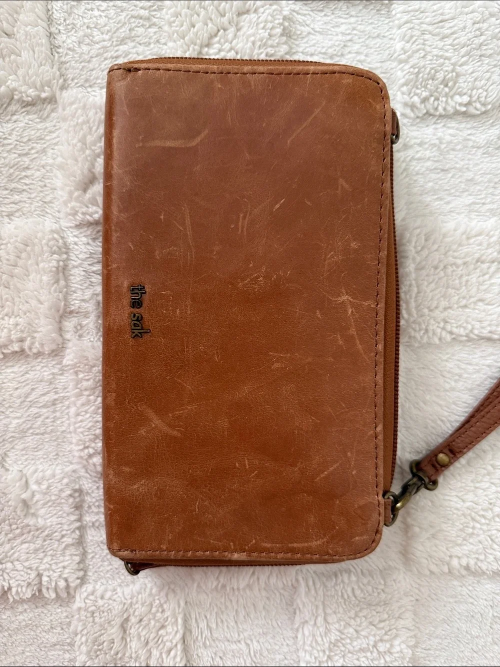 The Sak Embossed Leather Wristlet in Tan
